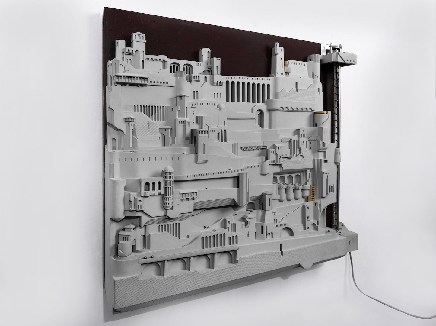 
                  
                    Amalfi – Continuous Loop Wall-Mounted Architectural Kinetic Sculpture in Concrete and Brass for Designers and Creators
                  
                