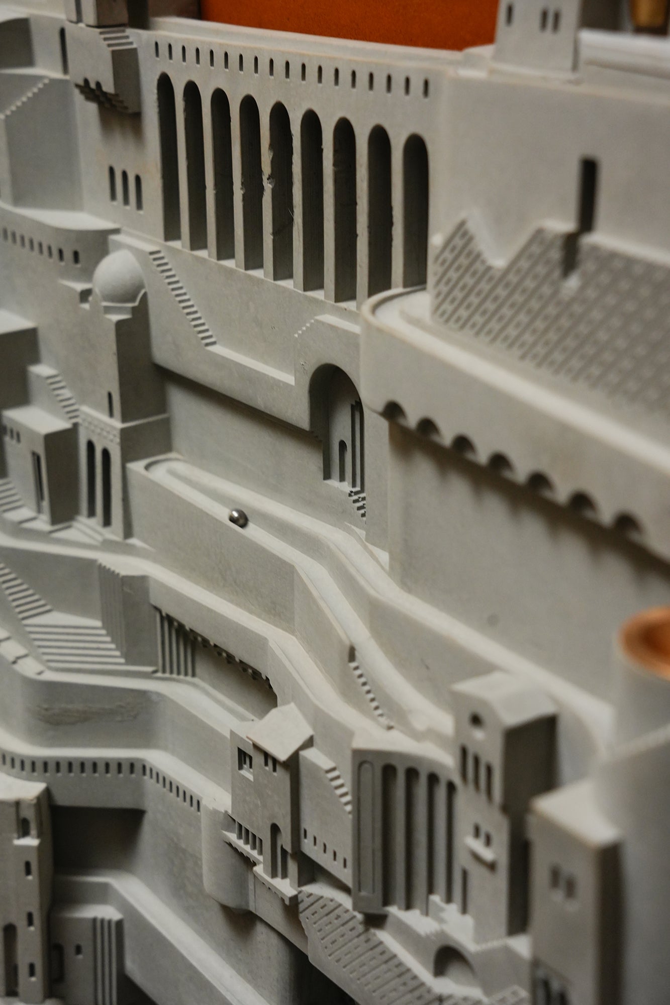 
                  
                    Amalfi – Continuous Loop Wall-Mounted Architectural Kinetic Sculpture in Concrete and Brass for Designers and Creators
                  
                