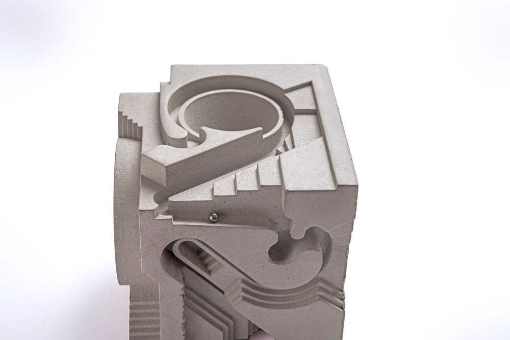 
                  
                    Twirl – Multi dimensional Brutalist Interactive Desk Companion Rolling ball sculpture
                  
                