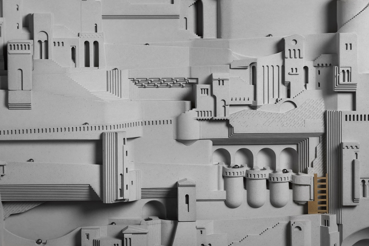 
                  
                    Amalfi – Continuous Loop Wall-Mounted Architectural Kinetic Sculpture in Concrete and Brass for Designers and Creators
                  
                
